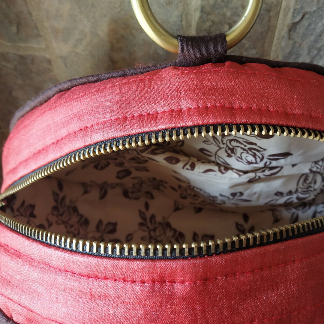 Tussar & Ajrakh Round Wrist Bag | Hand Crafted | 9 x 3 Inches