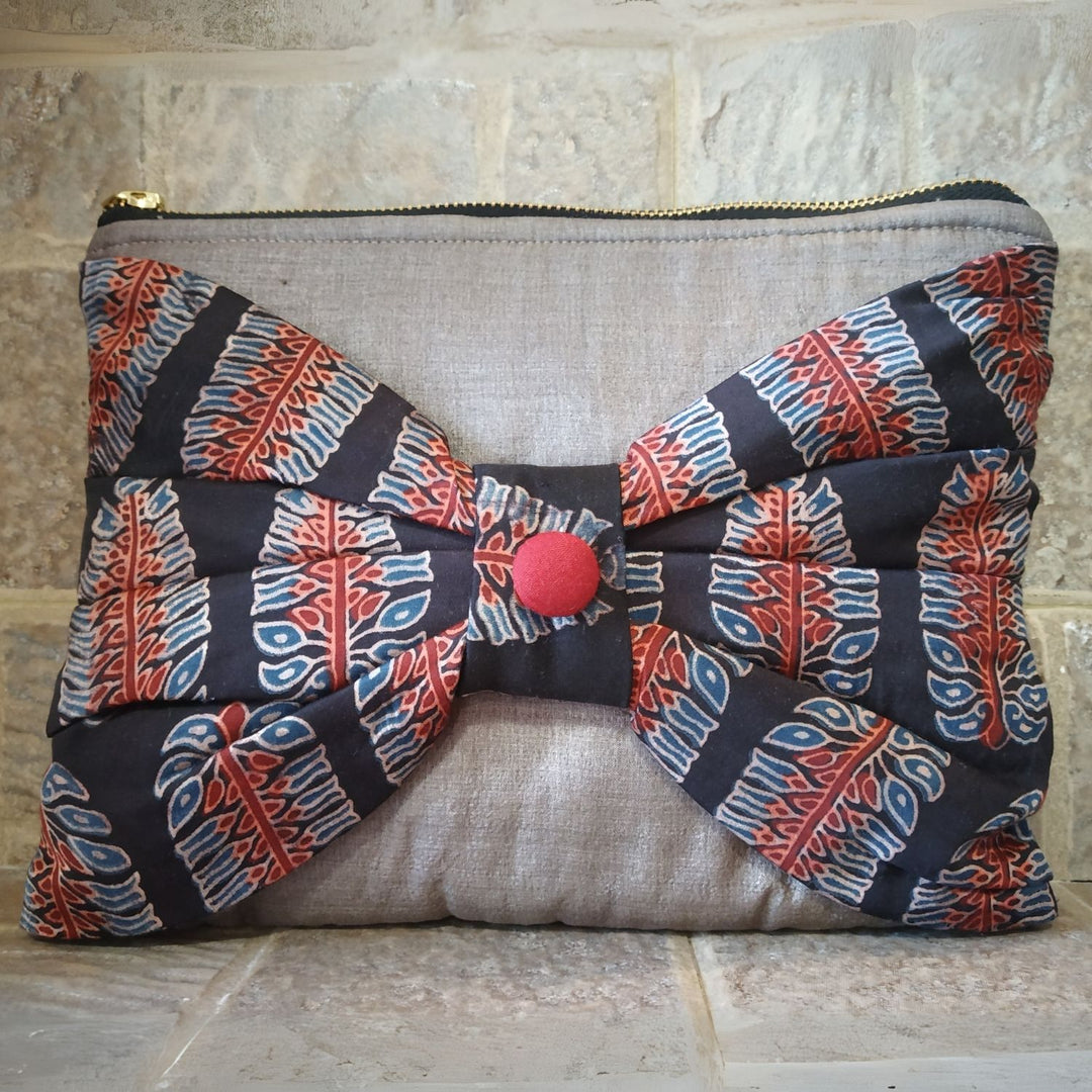 Heritage Charm | Ajrakh Bow Tussar Silk Clutch | Hand-Crafted