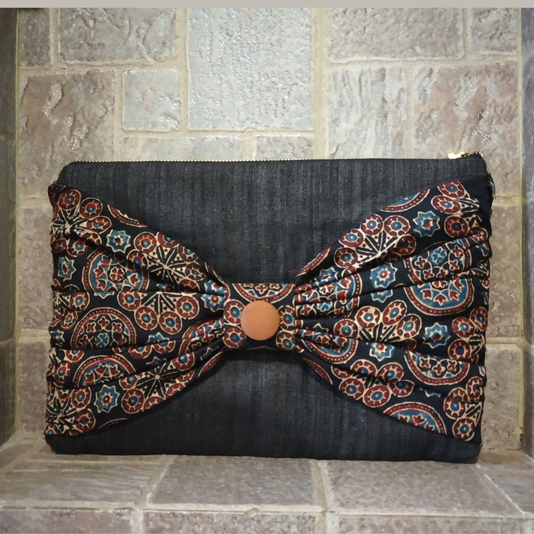 Charcoal Ajrakh Bow Tussar Silk Clutch | Handcrafted Elegance