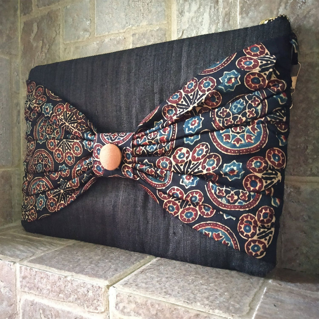 Charcoal Ajrakh Bow Tussar Silk Clutch | Handcrafted Elegance