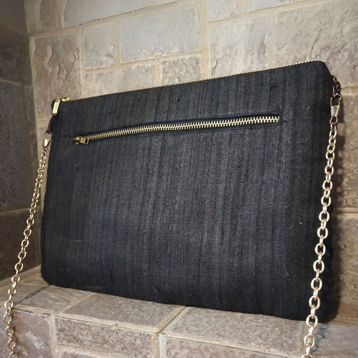 Charcoal Ajrakh Bow Tussar Silk Clutch | Handcrafted Elegance