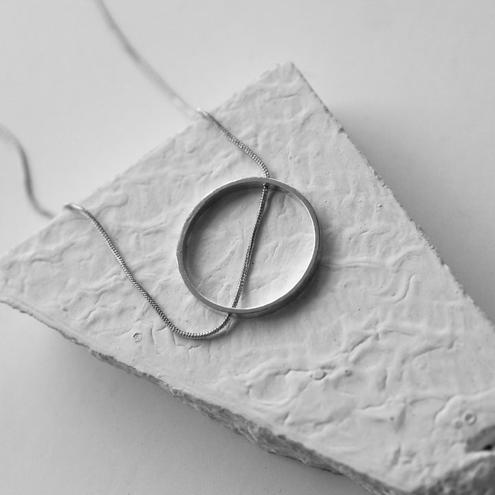 Slit A Circle | Silver Finish Brass Neckpiece | Bespoke  Design | Hand-Crafted | Sustainable